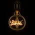 GloboStar® 99252 Λάμπα LED Ultra Thin Soft S Spiral Letter Filament E27 G125 LOVE Γλόμπος 2.4W 204lm 360° AC 220-240V IP20 Φ12.5 x Υ18cm Ultra Θερμό Λευκό 2200K με Μελί Γυαλί - Dimmable - 3 Years Warranty